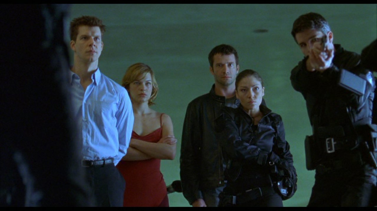 With Eric Mabius, Milla Jovovich, James Purefoy and Martin Crewes in Resident Evil.