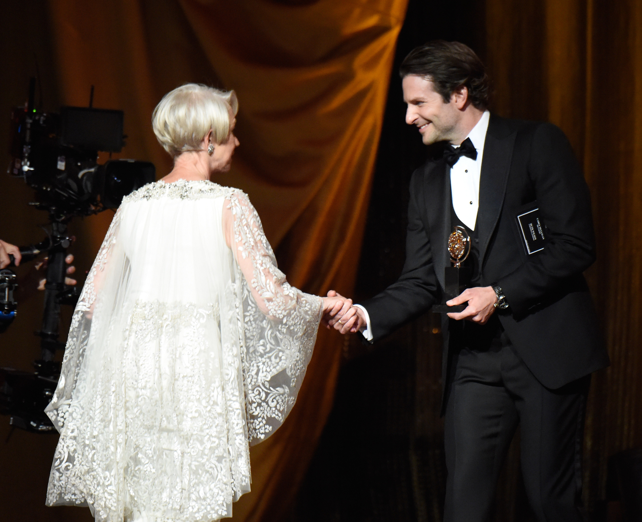 Helen Mirren, Bradley Cooper and Kevin Mazur