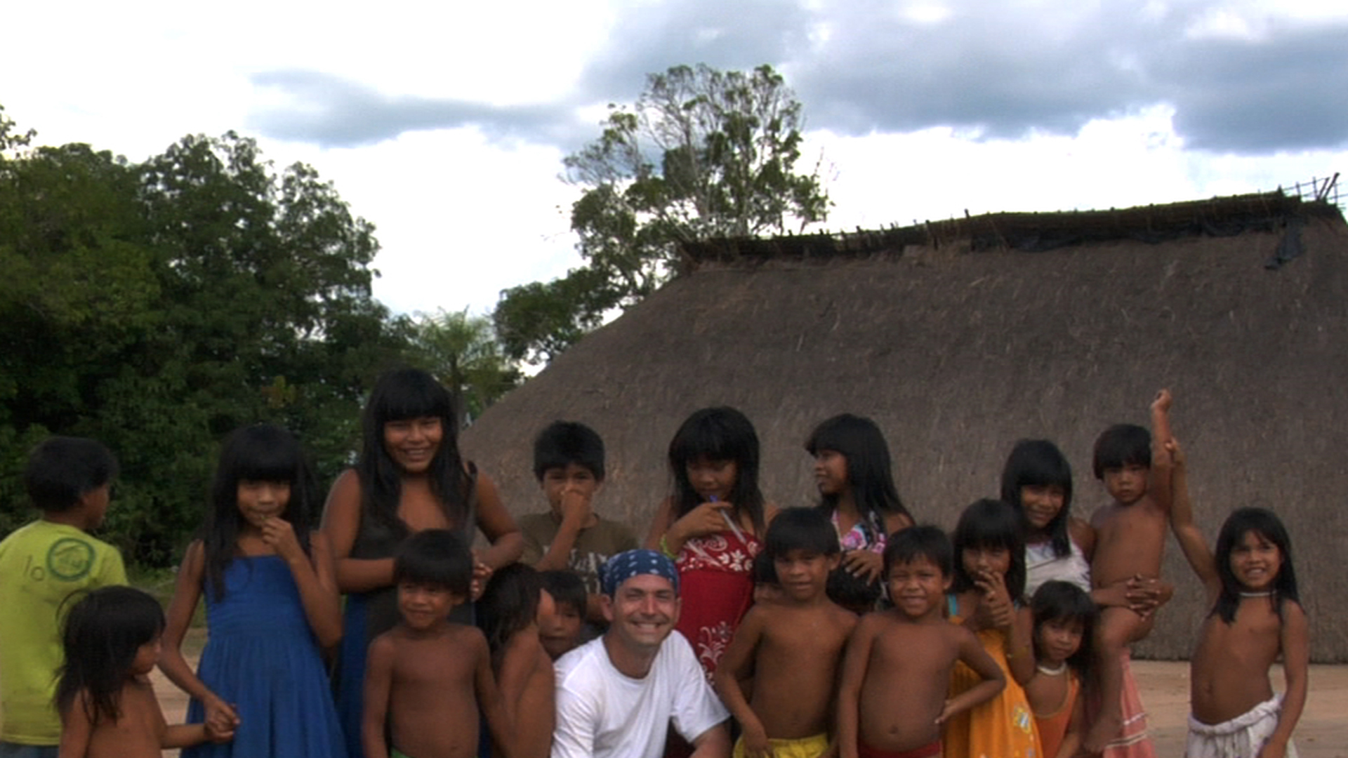 Tarek McCarthy with the Kamayura Tribe while directing a documentary in Northern Brazil.