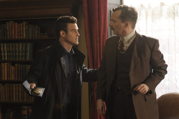 Still of Eddie McClintock and Ivan Sherry in Warehouse 13 (2009)