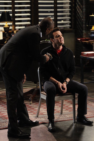 Still of Eddie McClintock and Charles Malik Whitfield in Warehouse 13 (2009)