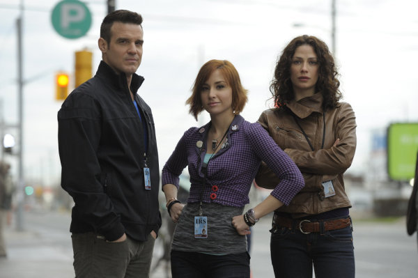 Still of Eddie McClintock, Joanne Kelly and Allison Scagliotti in Warehouse 13 (2009)