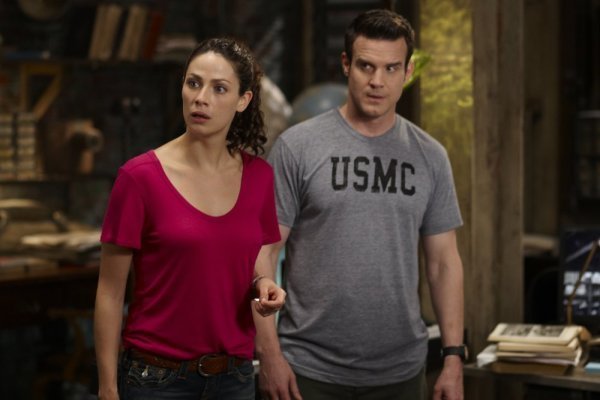 Still of Eddie McClintock and Joanne Kelly in Warehouse 13 (2009)