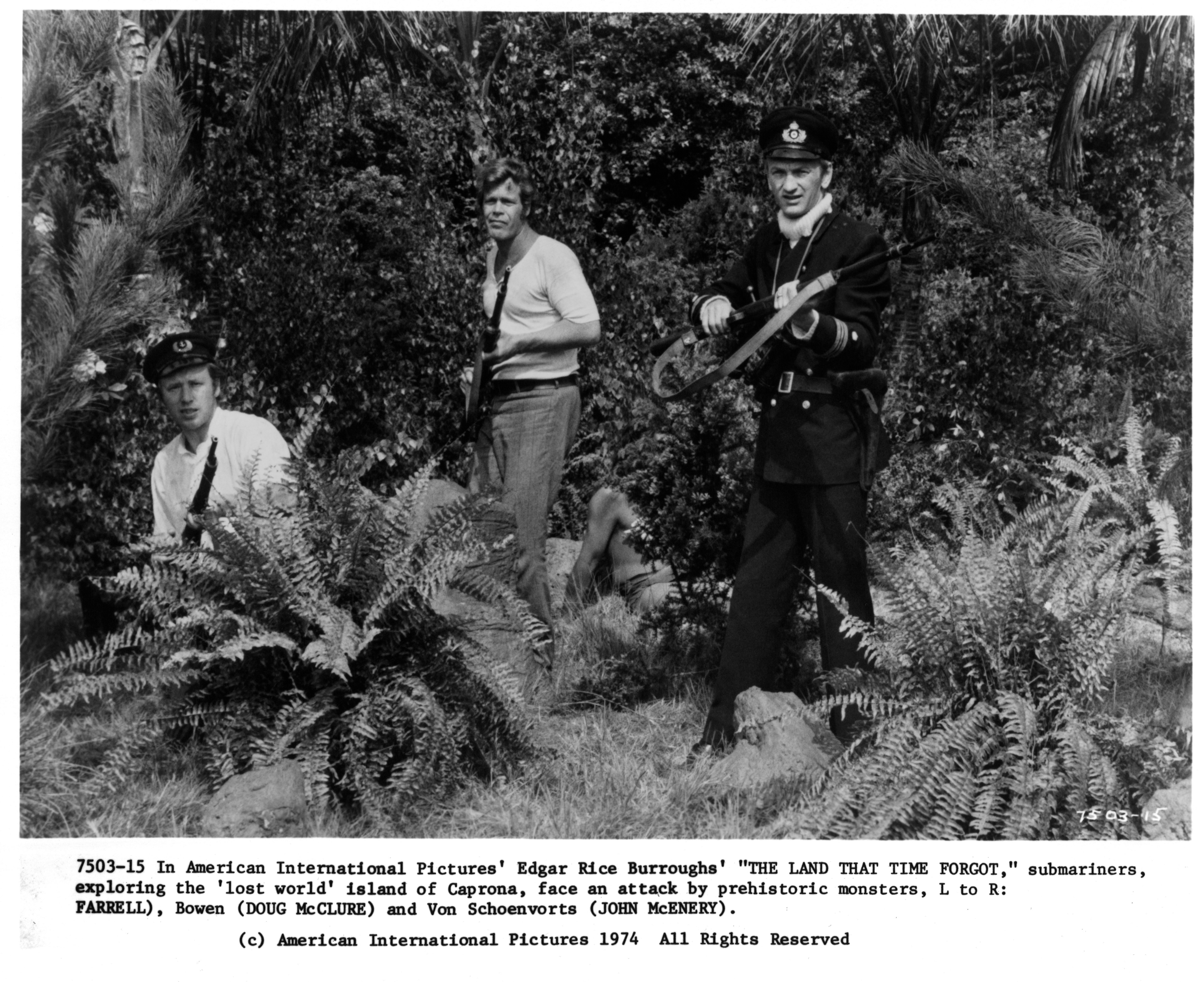 Still of Colin Farrell, Doug McClure and John McEnery in The Land That Time Forgot (1975)