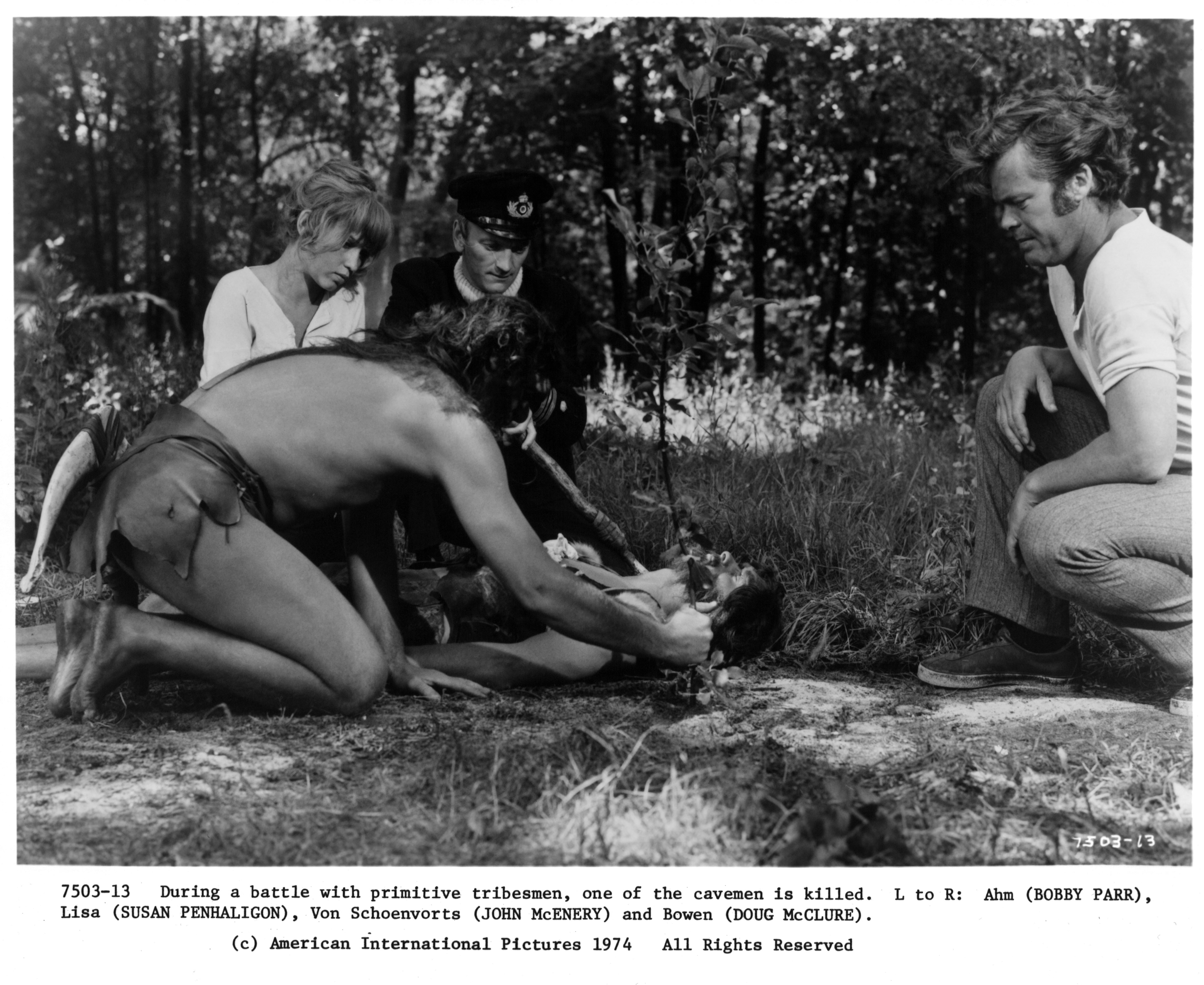 Still of Doug McClure, John McEnery, Bobby Parr and Susan Penhaligon in The Land That Time Forgot (1975)