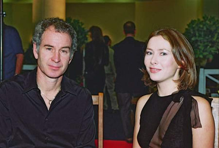 Host Agata Gotova and John McEnroe