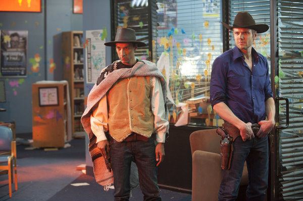 Still of Joel McHale and Danny Pudi in Community (2009)