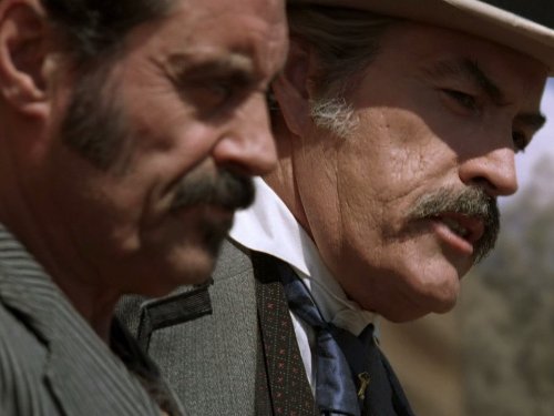Still of Powers Boothe and Ian McShane in Deadwood (2004)