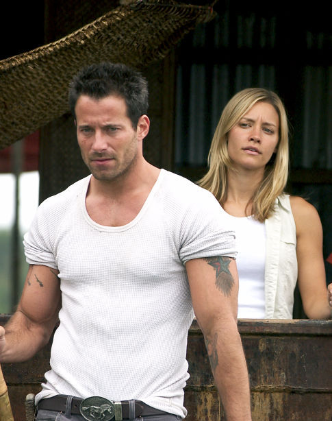 Still of Johnny Messner and KaDee Strickland in Anacondas: The Hunt for the Blood Orchid (2004)