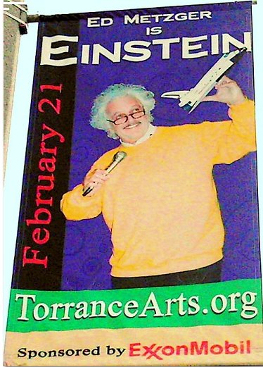 Advertisement on city street lamp-post for ED METZGER performing his nationally acclaimed EINSTEIN one-man theatrical show.