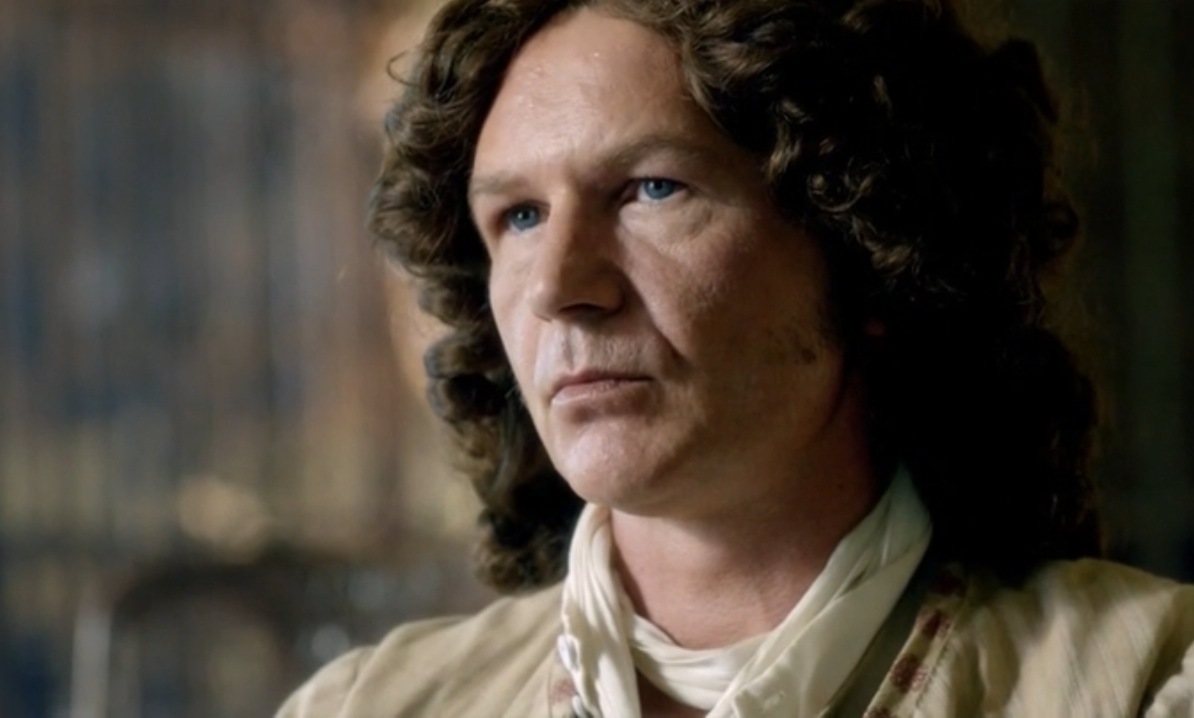 A scene from Black Sails season 1 episode 4 with Sean Cameron Michael as Richard Guthrie.