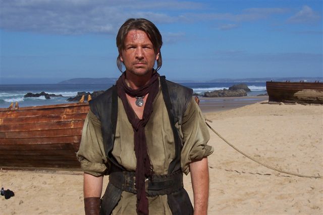 As Nolan Moore on the set of Crusoe (NBC)