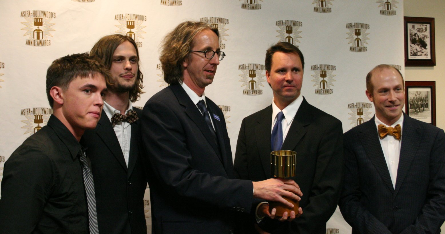 Presenters Jesse McCartney and Matthew Gray Gubler congratulate Best TV Production winners Kit Boss, Kenny Micka and Ben Stout