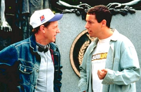 Director Dennis Dugan chats with Adam Sandler.