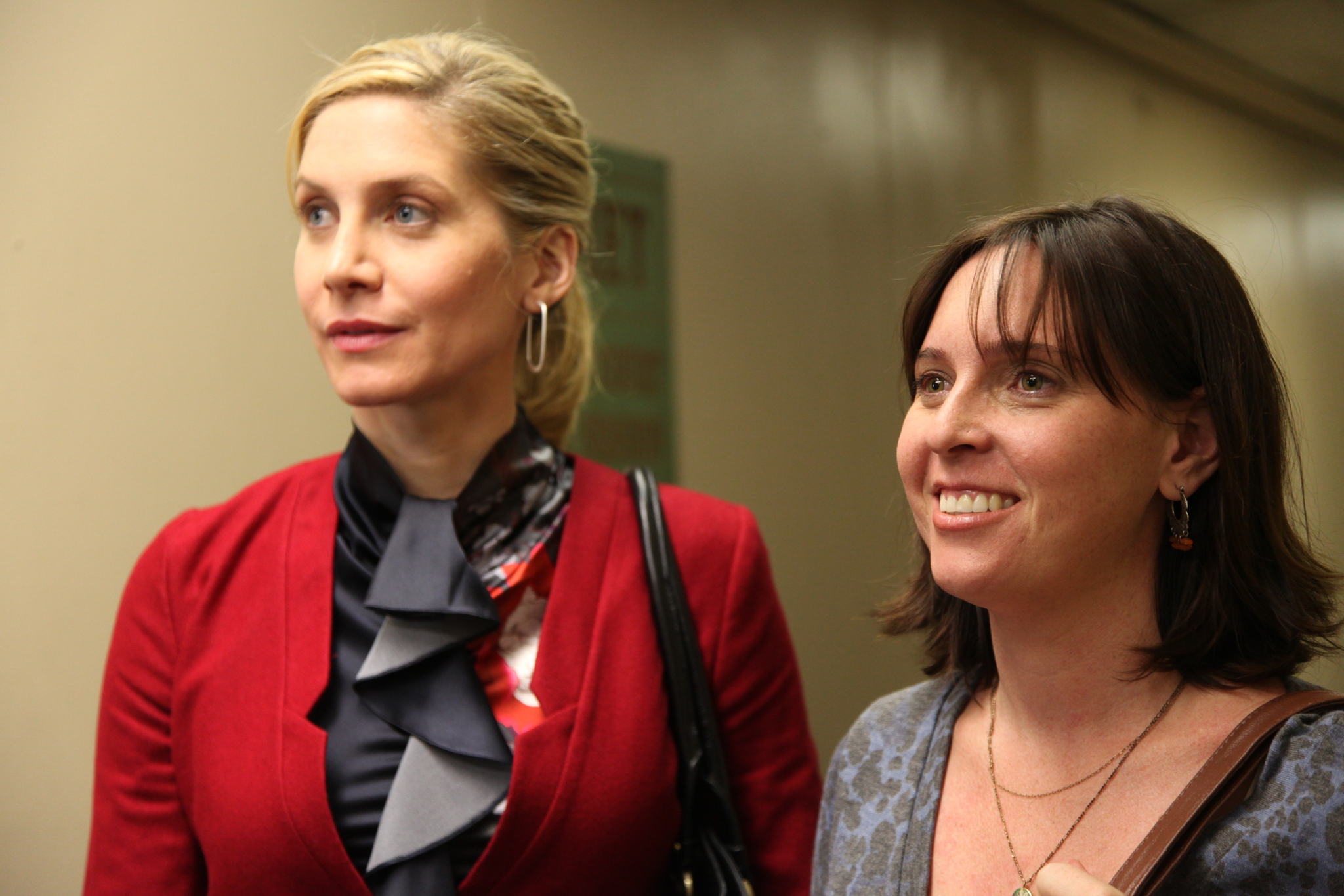 Still of Miranda Bailey and Elizabeth Mitchell in Answers to Nothing (2011)