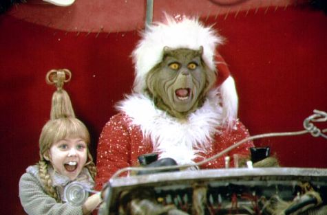 Cindy Lou Who rides in the sleigh with the Grinch (photo credit: Melinda Sue Gordon)
