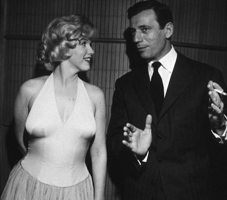 M. Monroe & Yves Montand at party for 