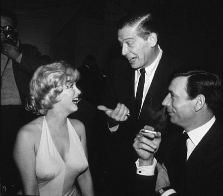 M. Monroe, Yves Montand & Milton Berle at a party for 