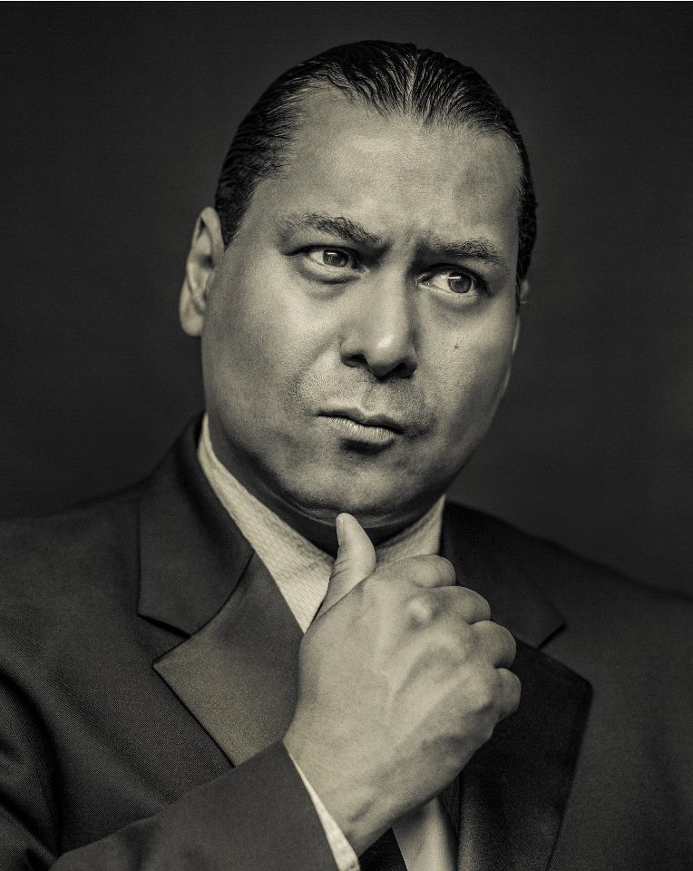 A Black & White still in character as a Pentecostal Preacher that was part of Ray Katchatorian's photography show 'Captured'which exhibited at the Arc Light Hollywood.