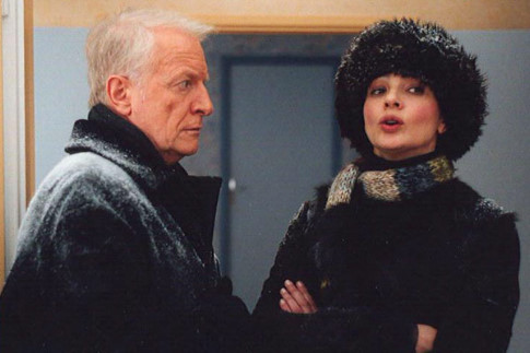 Still of André Dussollier and Laura Morante in Coeurs (2006)