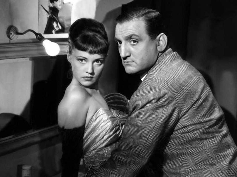 Still of Jeanne Moreau and Lino Ventura in Touchez pas au grisbi (1954)