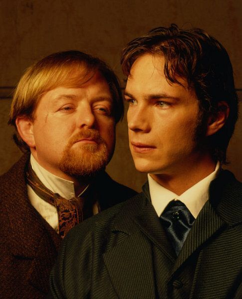 James D'Arcy and Roger Morlidge in Sherlock (2002)