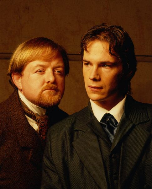 James D'Arcy and Roger Morlidge in Sherlock (2002)