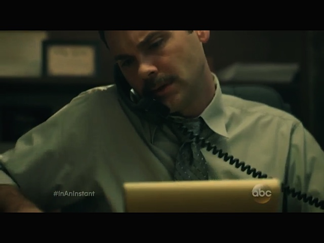 Detective Earl piecing together the case on ABC's In An Instant.