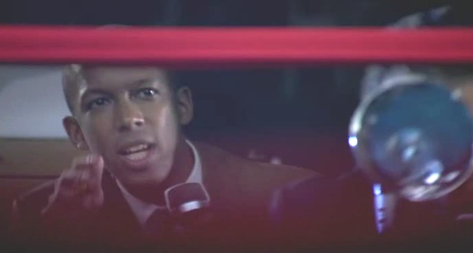 Screen shot from the feature film Phantom Punch - As ringside announcer Trent Mays