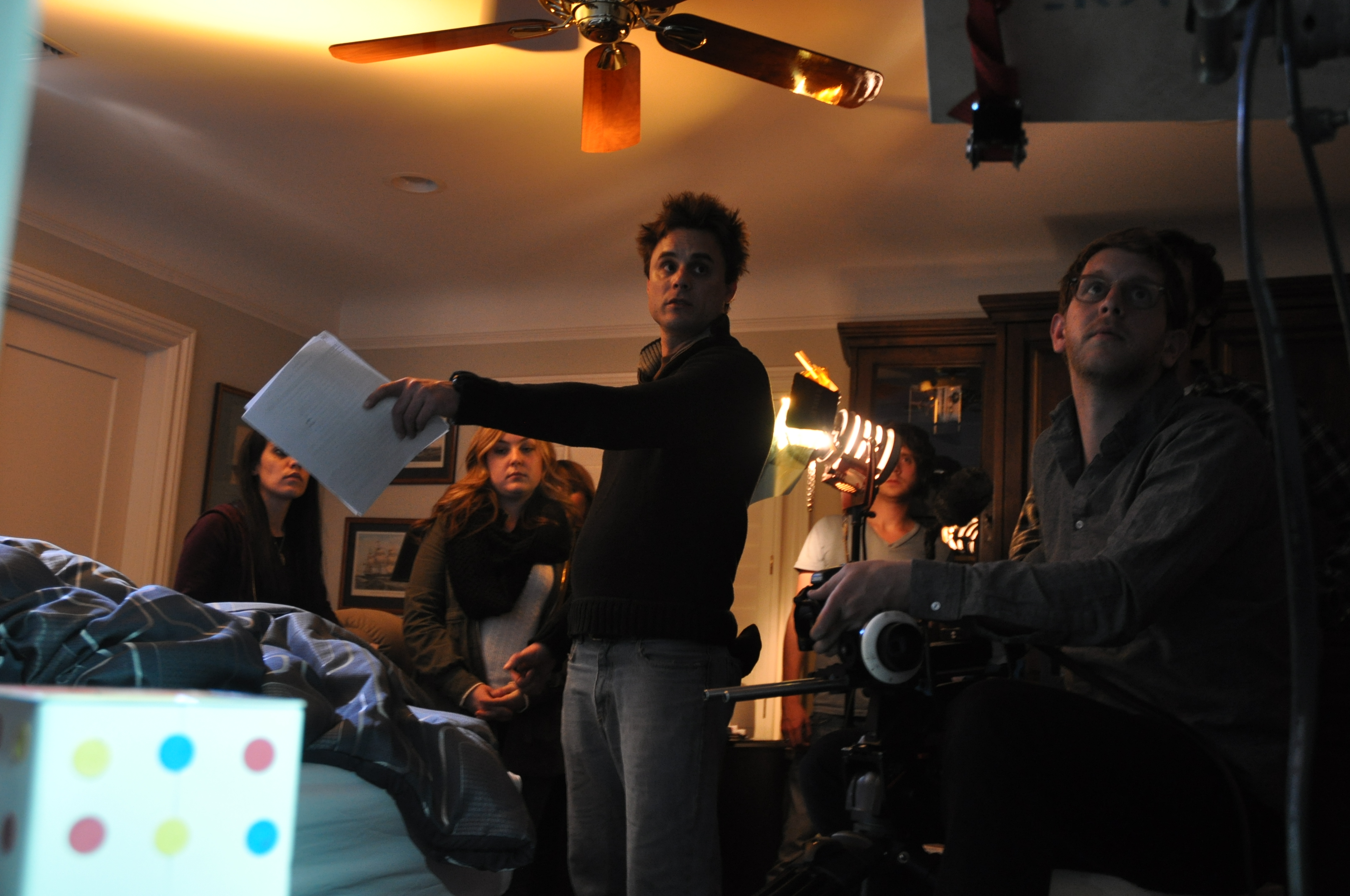 Producer Danielle Loo, Production Designer Maddie McVey, Director Bryce Mouer and Director of Photography Nate Lipp prepare to shoot a scene from GENRE.