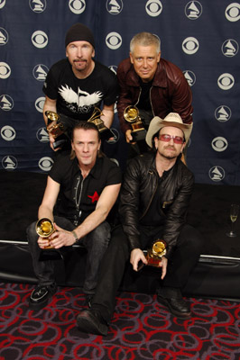Bono, Adam Clayton, Larry Mullen Jr., The Edge and U2 at event of The 48th Annual Grammy Awards (2006)