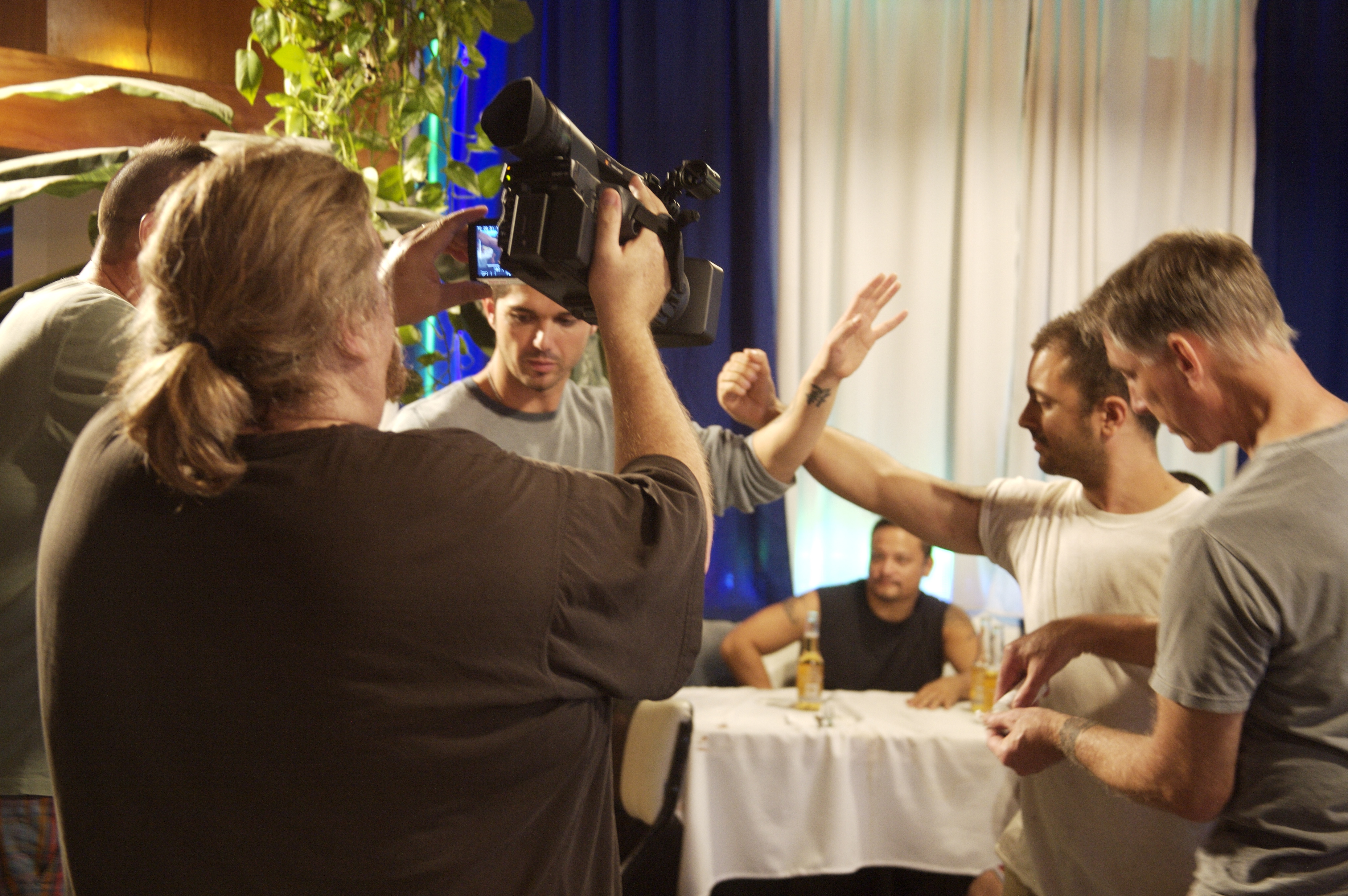 JD Fortune gets ready to slice open Val Tasso's arm on the set of Bloodwar.