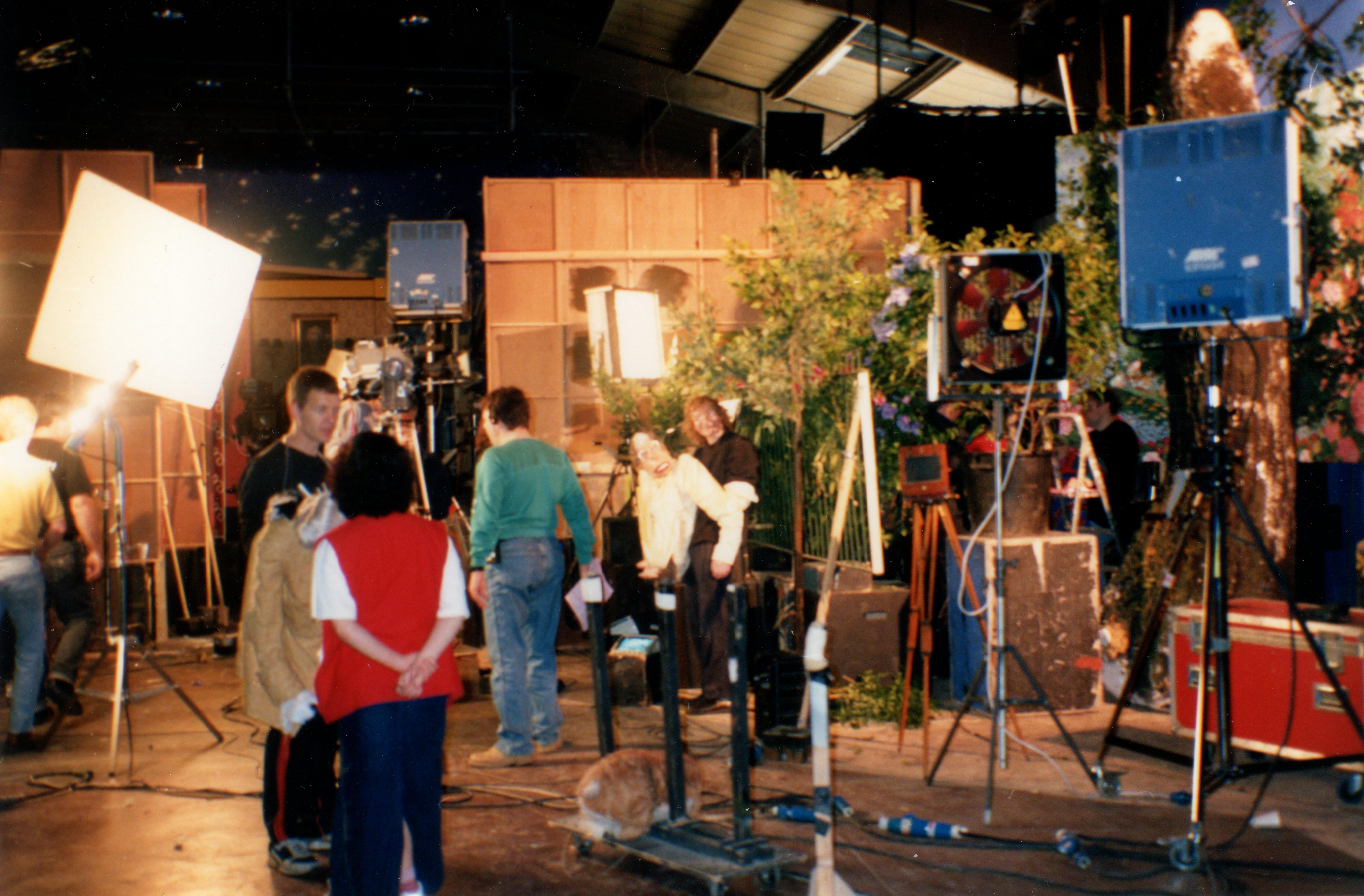 Steve Nallon, (centre) with puppet of The Queen on set of TV series SPITTING IMAGE.