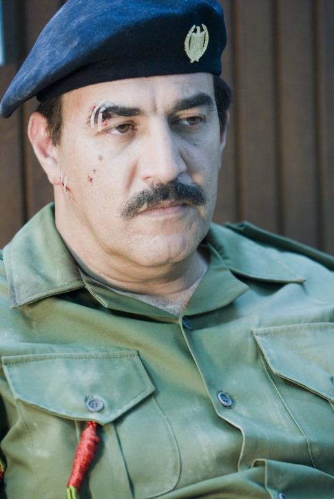 Still of Igal Naor in House of Saddam (2008)