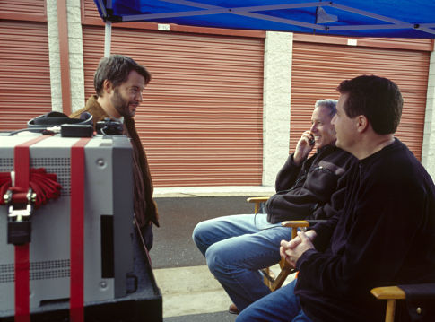 Writer/director Jeff Nathanson (right) and producer David Hoberman (center) review a comedic shot with Matthew Broderick (left).