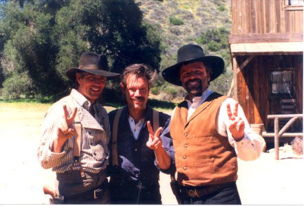 Eric Roberts Randy Travis and Steve Nave on the set of 