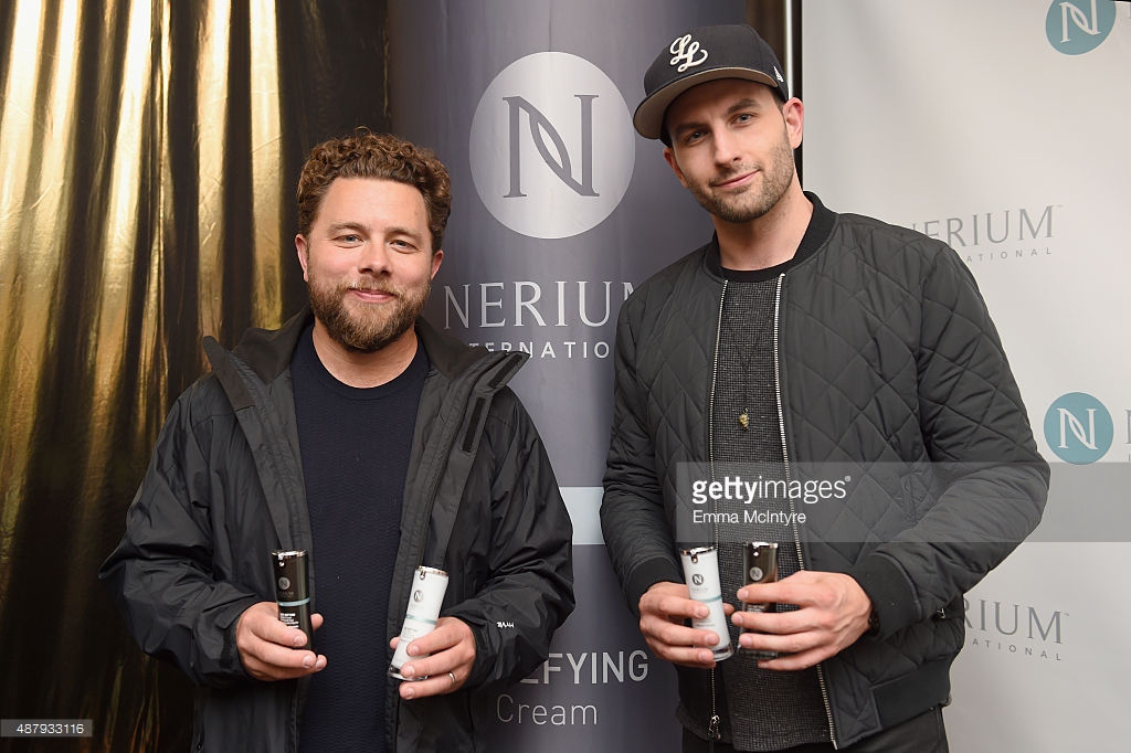 Actor Drew Nelson (R) and Joe Lasko attend the 6th annual Premiere Celebrity Gift & Style Lounge with Nerium International gifting their Optimera Formula products to TIFF's brightest stars at Delta on September 12, 2015 in Toronto, Canada.