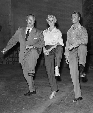 Doris Day, Gene Nelson, Director David Butler on the set of 