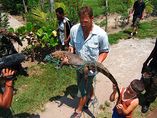 With the help of villagers, Keith Neubert saves a wild Cayman in Honduras.