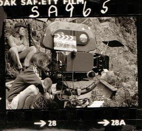Sophie Neville as a child on a film set, looking down the lens of DoP Denis Lewiston's 35mm Panavision on location in the English Lake District in 1973