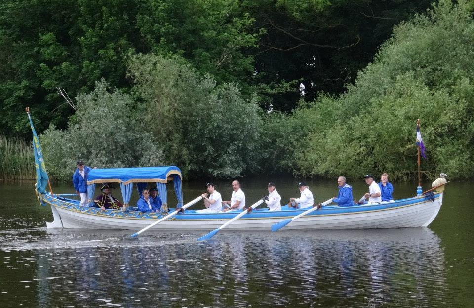 Sophie Neville rowing in the Magna Carta 800th Celebration