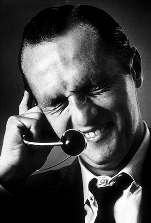 Bob Newhart enacting his telephone operator routine, 1961.