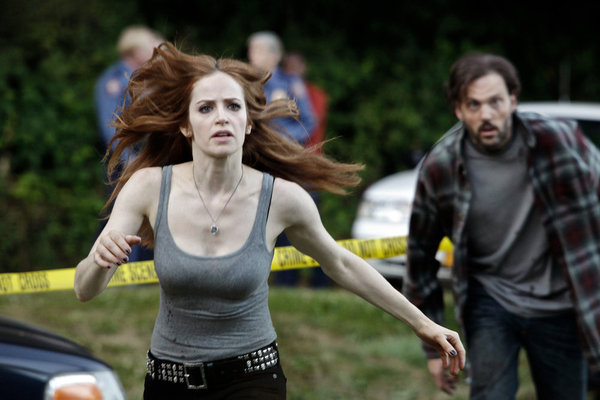 Still of Silas Weir Mitchell and Jaime Ray Newman in Grimm (2011)