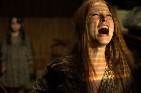 Lisa (RACHEL NICHOLS) faces true terror in THE AMITYVILLE HORROR.