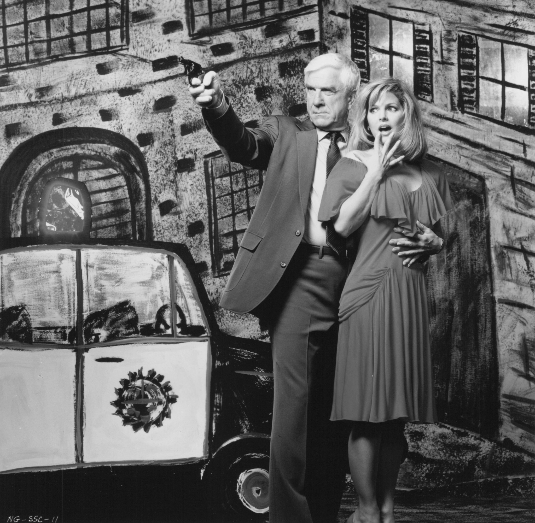 Still of Leslie Nielsen and Priscilla Presley in The Naked Gun: From the Files of Police Squad! (1988)