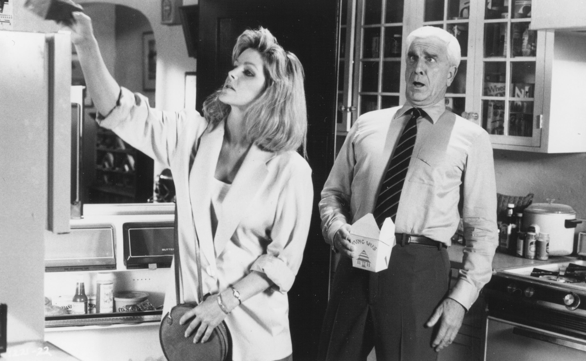 Still of Leslie Nielsen and Priscilla Presley in The Naked Gun: From the Files of Police Squad! (1988)