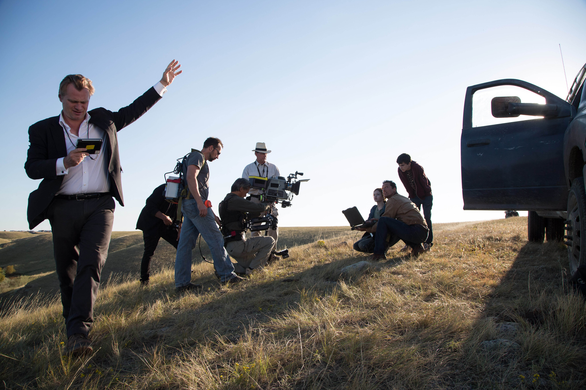 Matthew McConaughey, Christopher Nolan and Mackenzie Foy in Tarp zvaigzdziu (2014)