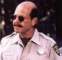 Zack Norman as Sheriff Rance Moreland in 