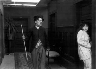 Charles Chaplin and Mabel Normand in Mabel's Strange Predicament (1914)