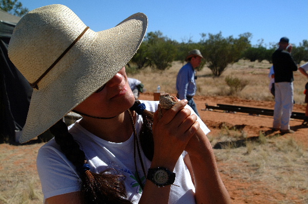 On set of Kangaroo Jack, Alice Springs, AU. Candida Nunez with Bearded Dragon.